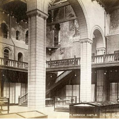 Historic sepia photograph of the interior of Norwich Castle