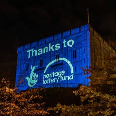 Projection on Norwich Castle with the words "Thanks to Heritage Lottery Fund"