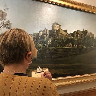 Person viewing a painting